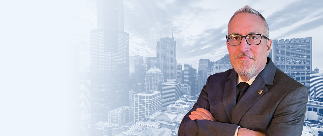 Attorney Michael C. Rosenblat with a city skyline